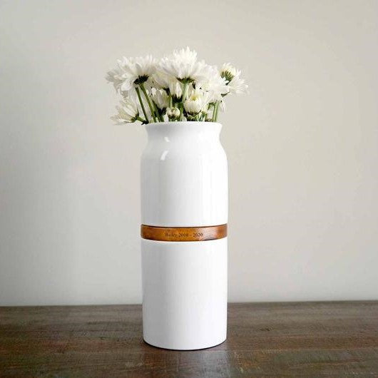 The Vega Vase Pet Urn in White with Dark Wood