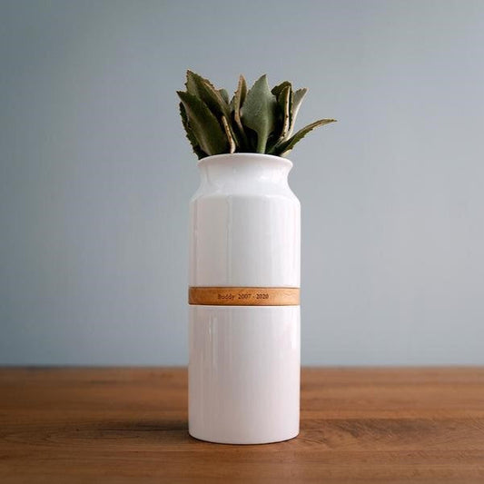 The Vega Vase Pet Urn in White with Light Wood