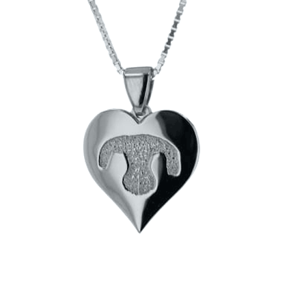 GIF of silver heart shaped pendant with nose print engraving. 
