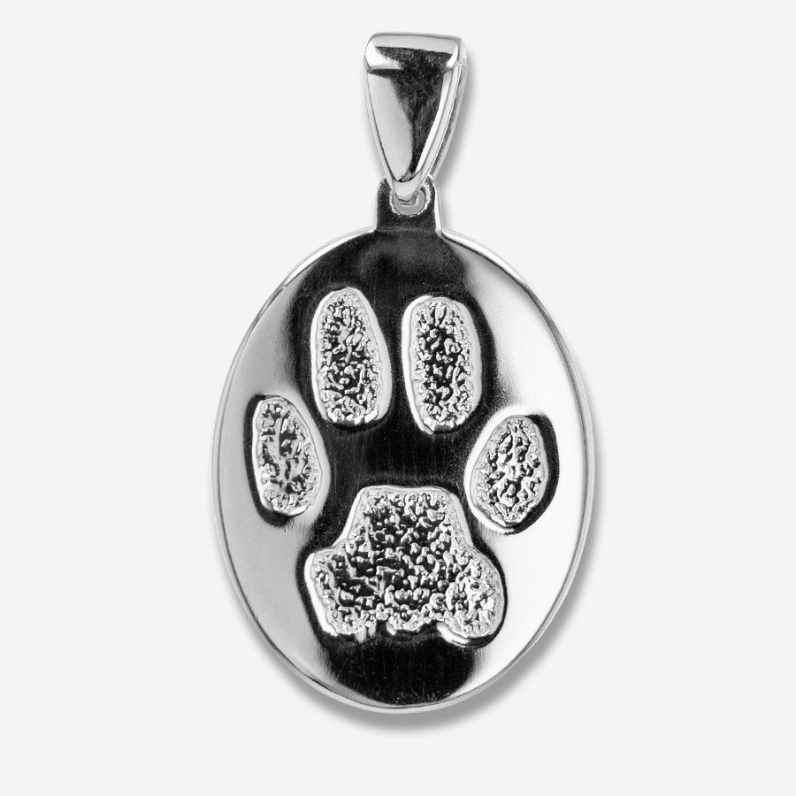 Silver pendant with a paw print design on a white background
